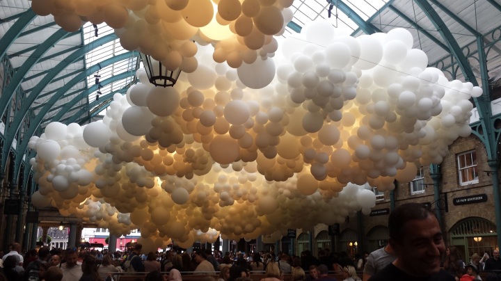 French artist Charles Pétillon presents his first public art installation – and his first ever live work outside of France – in Covent Garden as 100,000 giant white balloons fill the grand interior of the 19th Century Market Building.